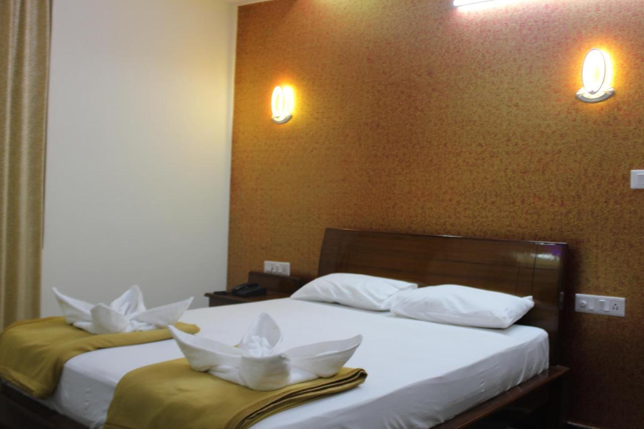 Golden Pride Hotel Kanakapura Bagian luar foto