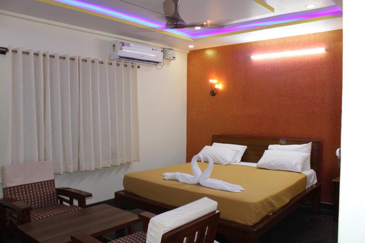 Golden Pride Hotel Kanakapura Bagian luar foto