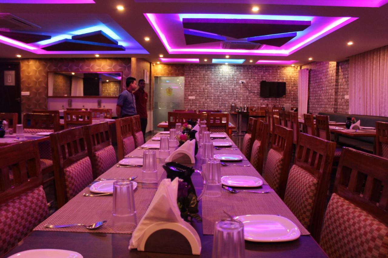 Golden Pride Hotel Kanakapura Bagian luar foto