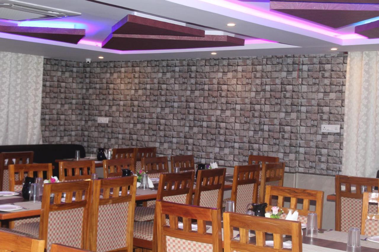 Golden Pride Hotel Kanakapura Bagian luar foto