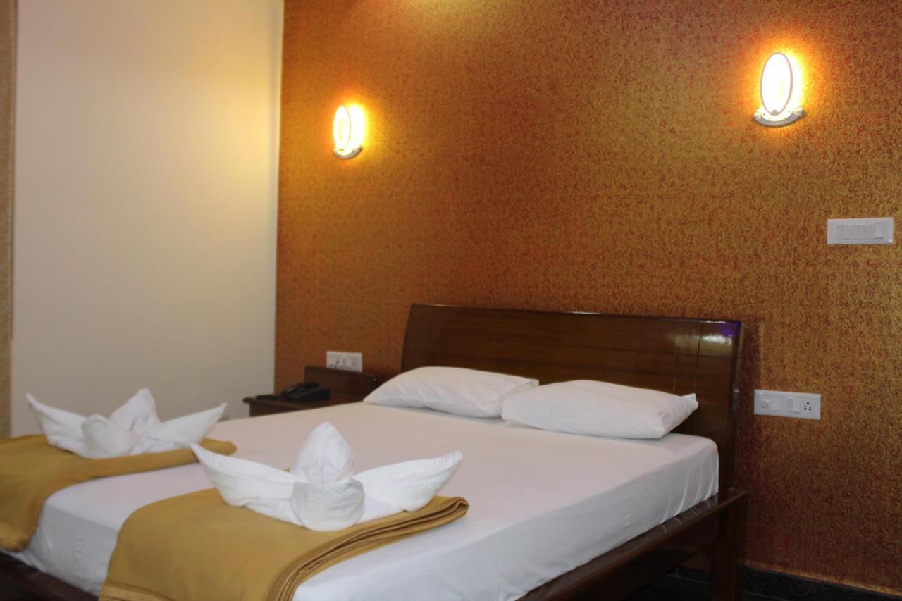 Golden Pride Hotel Kanakapura Bagian luar foto